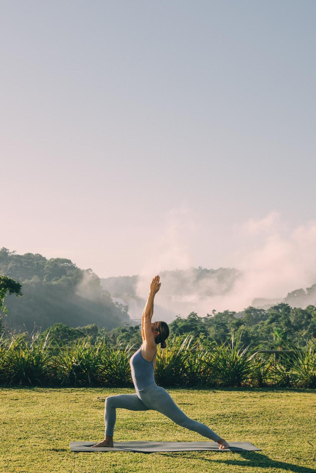 Gran Melia Iguazu Hotel Puerto Iguazu Ngoại thất bức ảnh A man practicing yoga in the mountains